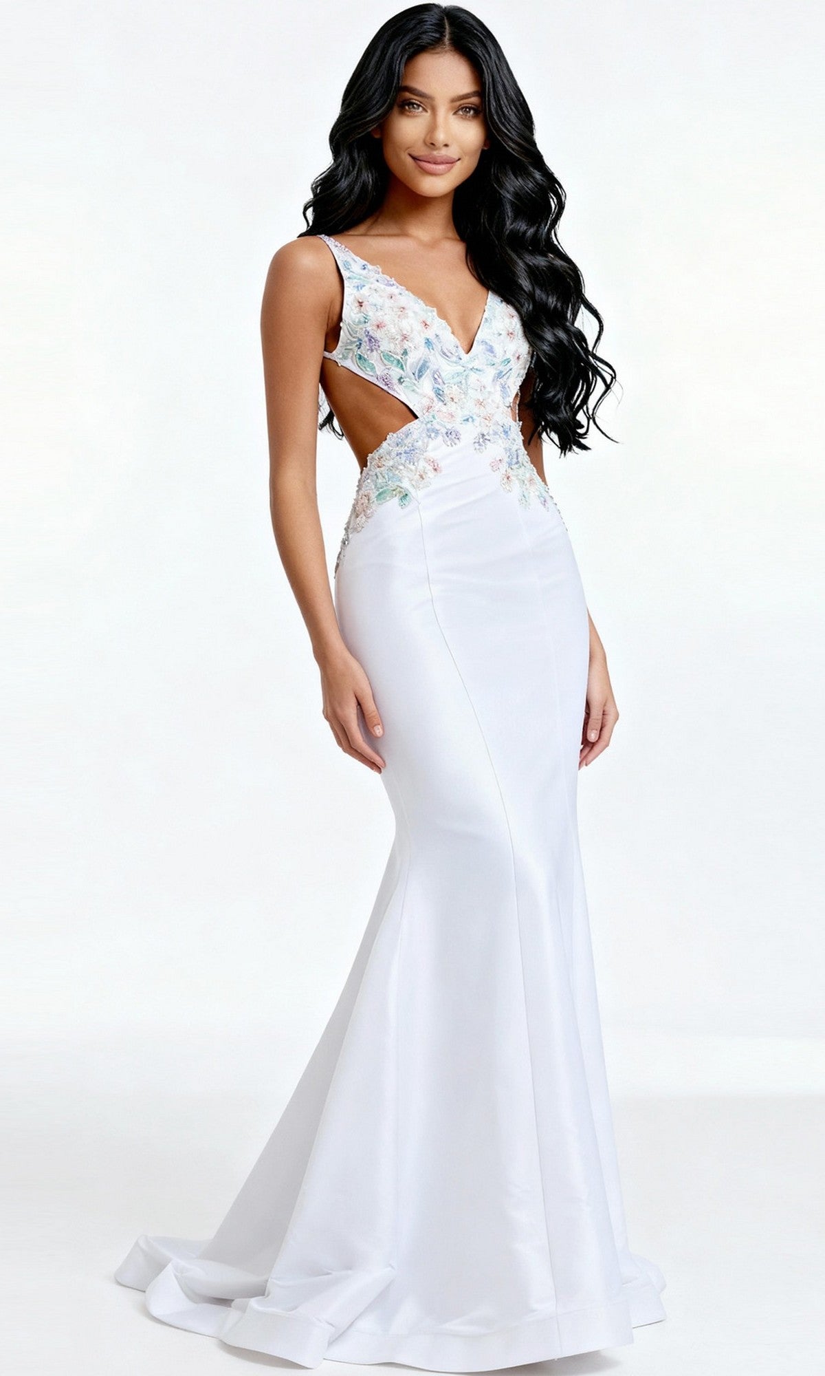 A woman wears the Jovani 48176 long prom dress in off white/multi, featuring a floor-length, sleeveless design with floral embroidery on the bodice and side cutouts, standing against a plain white background.